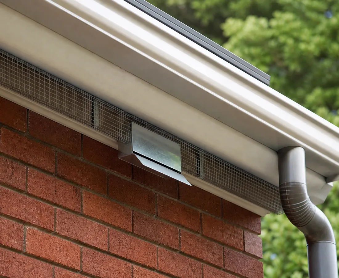Finished possum proofing with mesh over a roof vent and eave gap